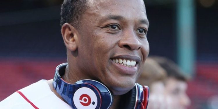 BOSTON - APRIL 04: Producer and musician Dr. Dre is on the field before the Boston Red Sox take on the the New York Yankees on April 4, 2010 during Opening Night at Fenway Park in Boston, Massachusetts. Dre is promoting the Boston Red Sox version of his Beats by Dr. Dre headphones.   Elsa/Getty Images/AFP== FOR NEWSPAPERS, INTERNET, TELCOS & TELEVISION USE ONLY ==